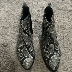 Snake skin heeled booties with silver stud